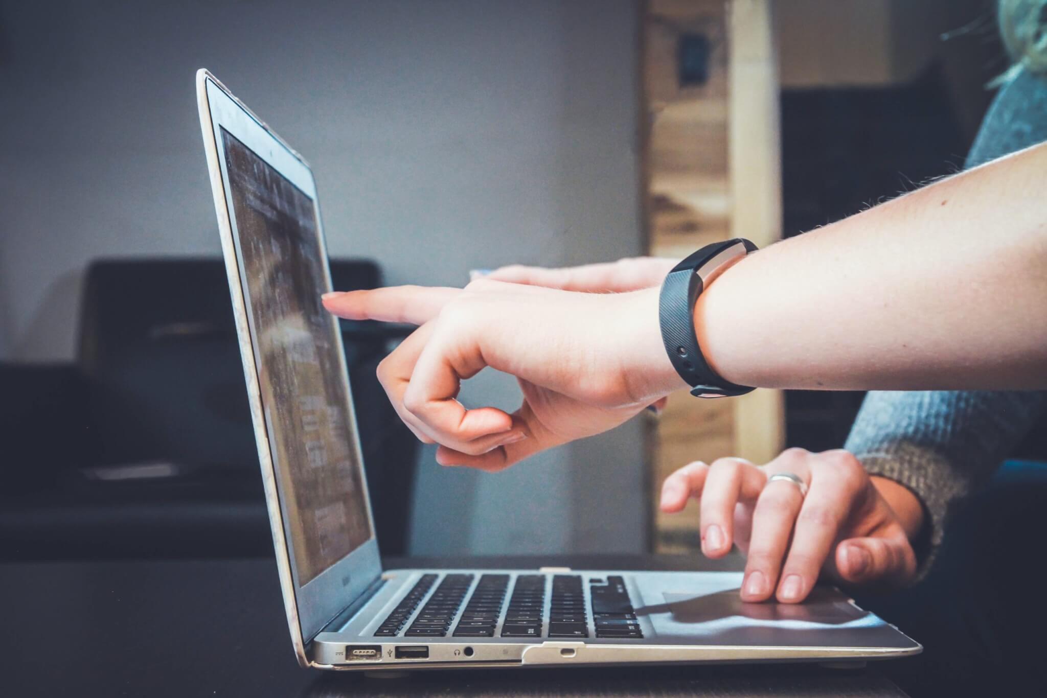 person using laptop, computer