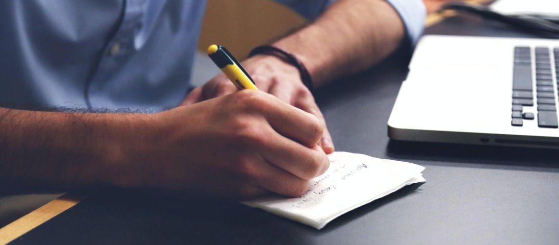 Free Person Writing on Paper Using Yellow and Black Pen Stock Photo, small business preparedness