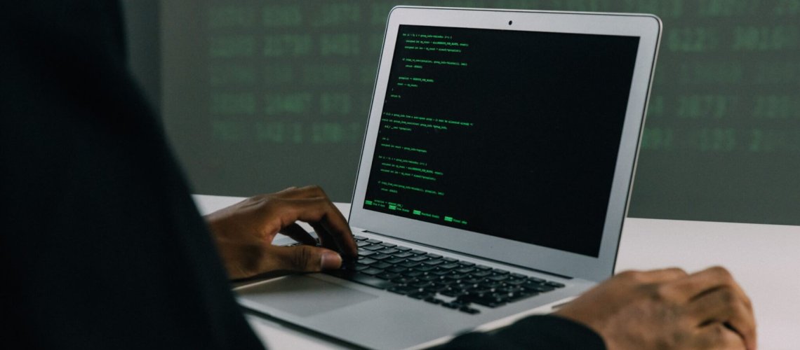 Free Person Using Macbook Air Stock Photo, Defense-in-Depth Cybersecurity