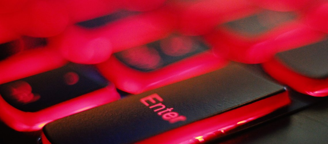 a close up of a red and black keyboard